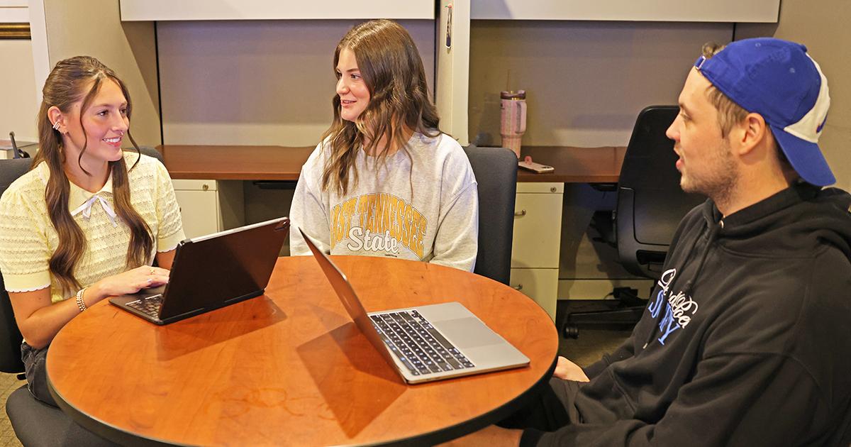Tutors working together in the tutoring room.