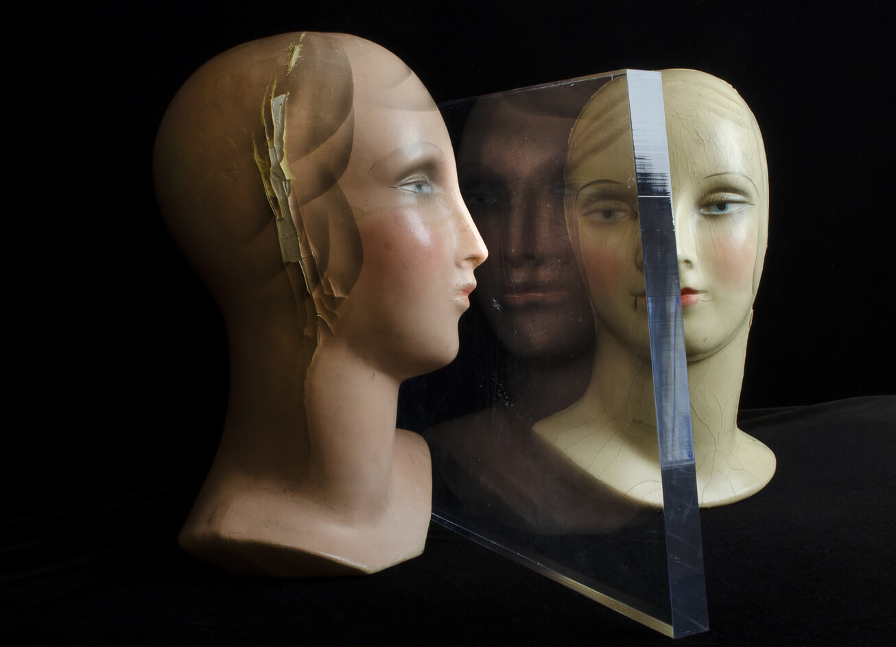 Two 1920s - 1930s mannequin heads for displaying hats from Masengills Specialty Store in Johnson City, TN.