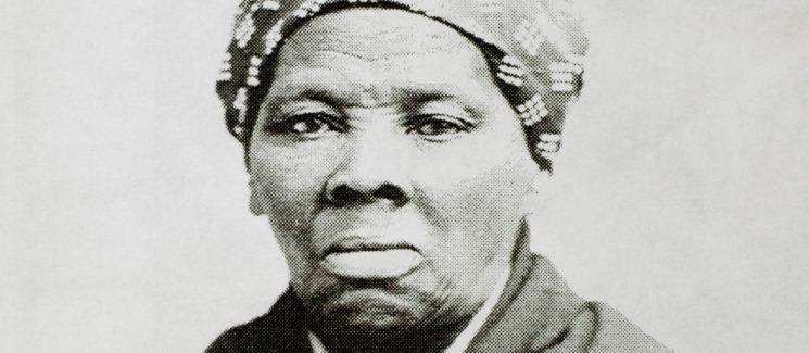 Harriet Tubman on a gray background