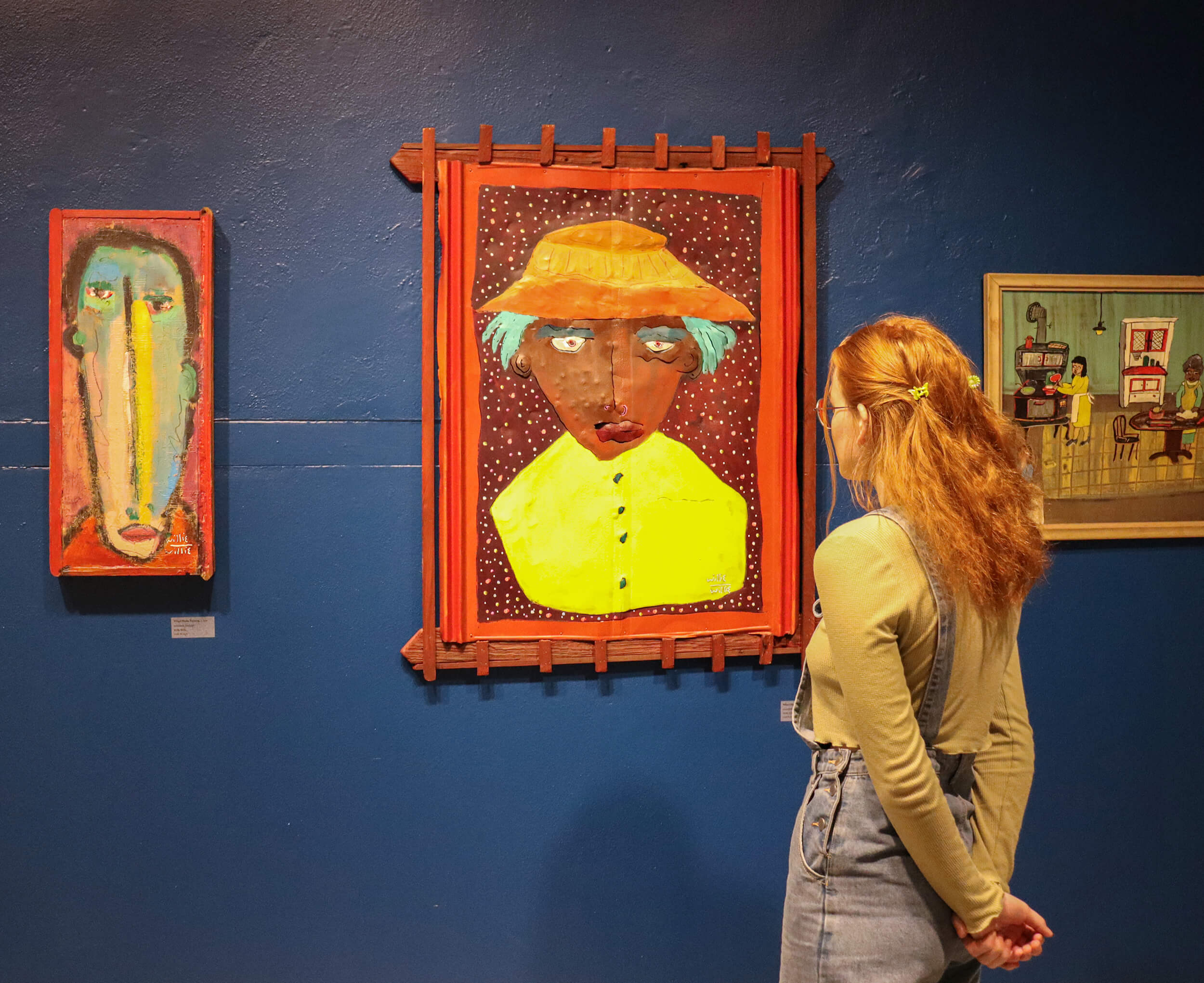 A student views the Sammie L. Nicely Collection, 2023.