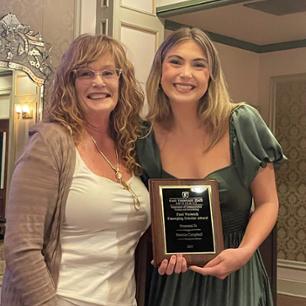 Student receives award from faculty member