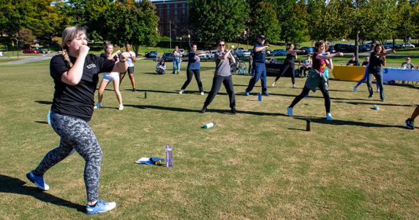 Group fitness class exercising outside 差's Center for Physical Activity