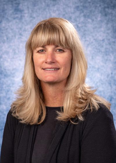Dr. Michelle Chandley, Associate Professor of Biomedical Sciences Department pictured wearing a black shirt. of Michelle Chandley