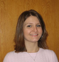 Dr. Jennifer Hall, Associate Professor of Biomedical Sciences Department pictured wearing a pink sweater. of Jennifer Vanover Hall