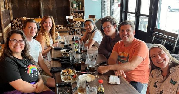 Lab Staff and Students pictured at a dining table at Jacqueline Chivers farewell Luncheon.