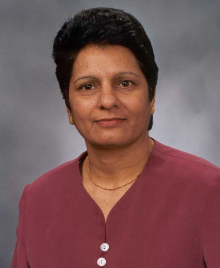 Dr. Krishna Singh, Chair of Biomedical Sciences Department pictured wearing a red shirt. of Krishna Singh, PhD, FAHA, FAPS, QDRF