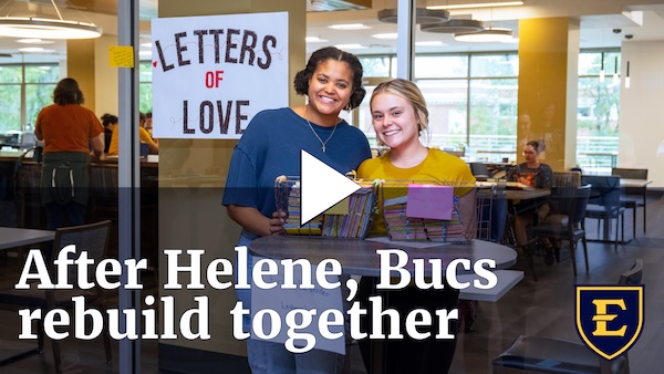 YouTube thumbnail depicting two students smiling as they write letters of love to first responders. The text reads 