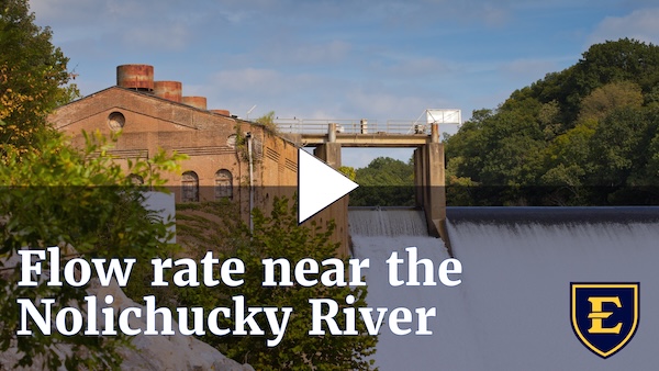 YouTube thumbnail depicting water flowing over the Nolichucky Dam. The text reads 